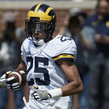 Apr 15, 2017; Ann Arbor, MI, USA; Michigan Wolverines Benjamin St. Juse (25) runs the ball during the Michigan Spring Game at Michigan Stadium. Mandatory Credit: Rick Osentoski-Imagn Images