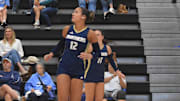 Elizabethtown High School volleyball players Jessica Smallwood, left, Lexi Davis, middle, and Maci Singleton, right, watch the ball ascend during a match Oct. 7, 2025 against Mercy Academy. Elizabethtown is eighth in our Top 10 Kentucky Girls Rankings.  