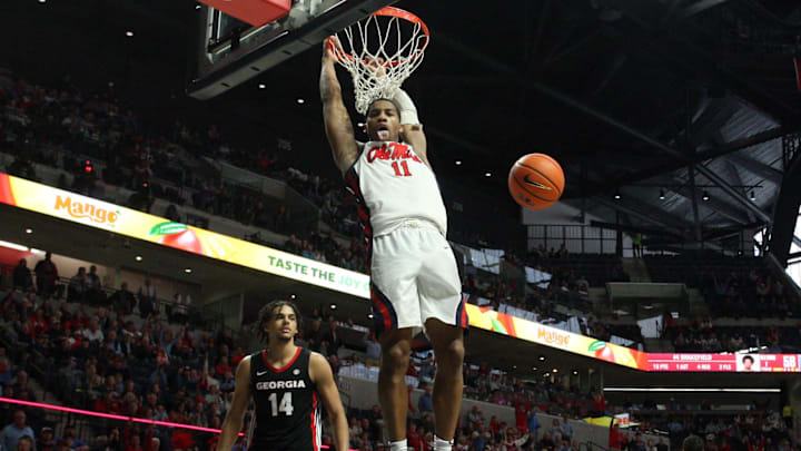 Jan 4, 2025; Oxford, Mississippi, USA; Mississippi Rebels guard Matthew Murrell (11) reacts after a dunk during the second half against the Georgia Bulldogs at The Sandy and John Black Pavilion at Ole Miss. Mandatory Credit: Petre Thomas-Imagn Images Jan 4, 2025; Oxford, Mississippi, USA; Mississippi Rebels guard Matthew Murrell (11) reacts after a dunk during the second half against the Georgia Bulldogs at The Sandy and John Black Pavilion at Ole Miss. Mandatory Credit: Petre Thomas-Imagn Images