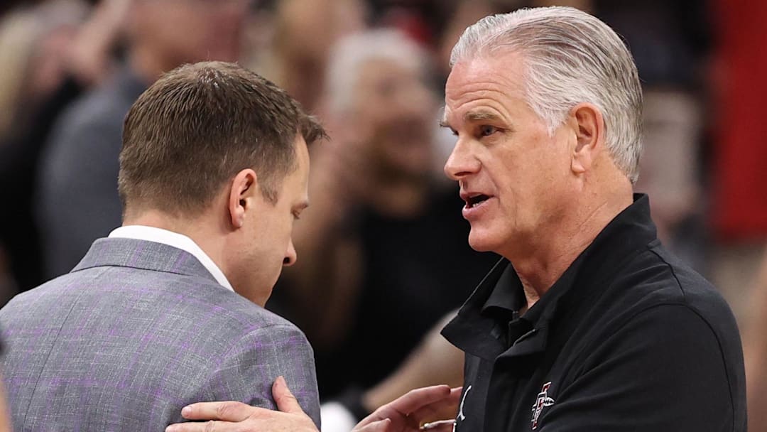 Furman Paladins head coach Bob Richey greets San Diego State Aztecs head coach Brian Dutcher. Mandatory Credit: Matt Pendleton-Imagn Images