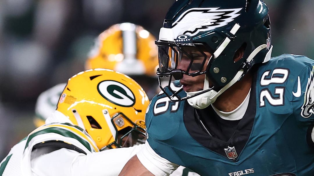 Philadelphia Eagles running back Saquon Barkley (26) rushes the ball against the Green Bay Packers in the playoffs.