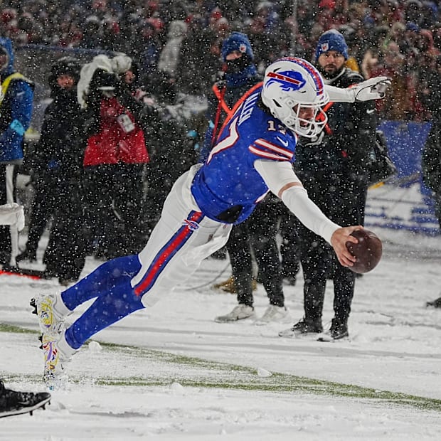 Buffalo Bills quarterback Josh Allen scores a touchdown against the San Francisco 49ers.