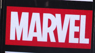 In this photo illustration, Marvel Entertainment logo seen...