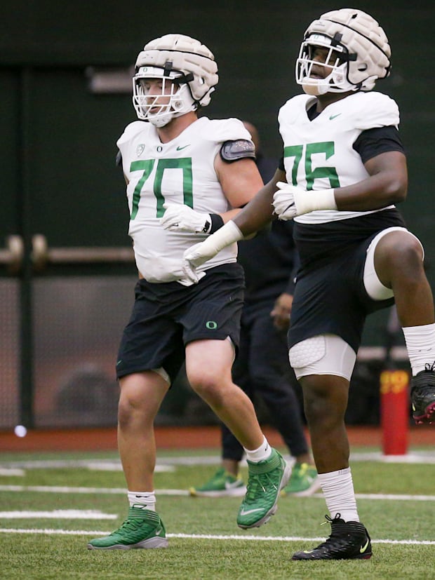 Oregon offensive linemen Charlie Pickard, and Josh Conerly Jr.