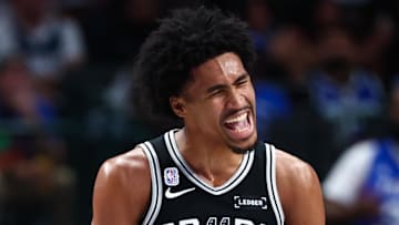 Oct 22, 2025; Dallas, Texas, USA;  San Antonio Spurs guard Dylan Harper (2) reacts during the game against the Dallas Mavericks at American Airlines Center. Mandatory Credit: Kevin Jairaj-Imagn Images