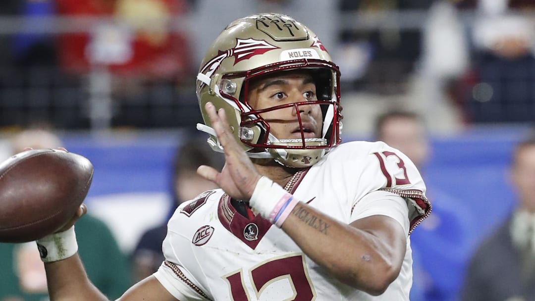 Nov 4, 2023; Pittsburgh, Pennsylvania, USA;  Florida State Seminoles quarterback Jordan Travis (13) passes the ball against the Pittsburgh Panthers during the third quarter at Acrisure Stadium. The Seminoles won 24-7. Mandatory Credit: Charles LeClaire-Imagn Images