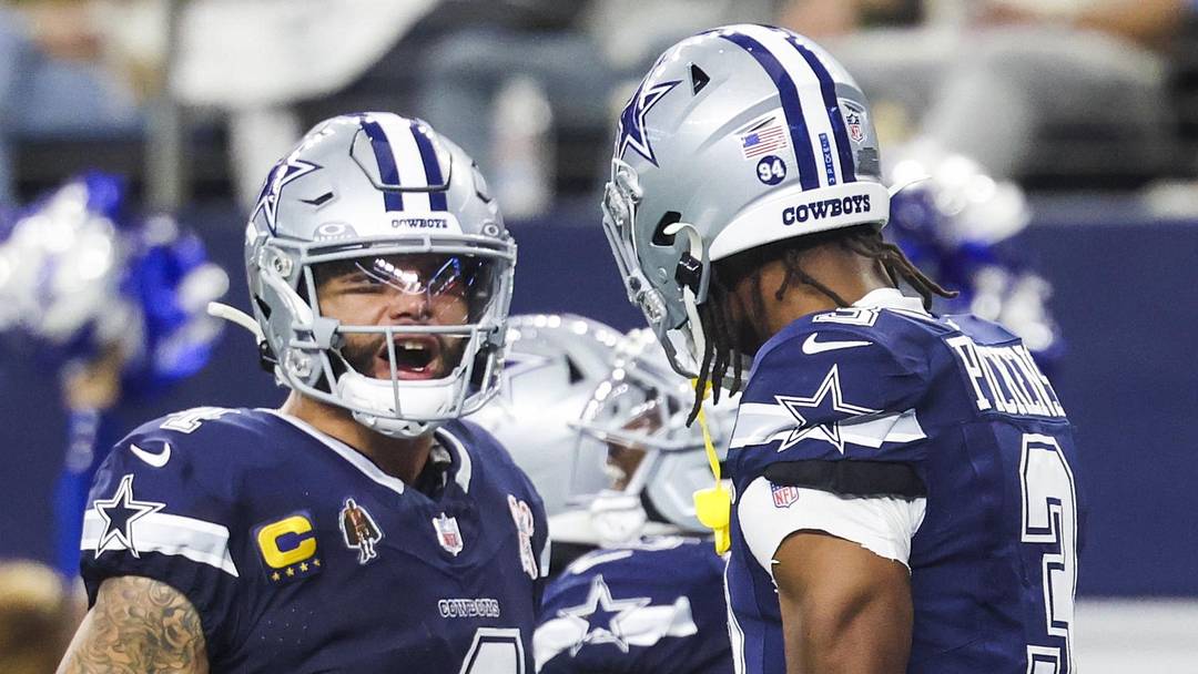 Dec 21, 2025; Arlington, Texas, USA; Dallas Cowboys quarterback Dak Prescott (4) celebrates with wide receiver George Pickens (3) following a touchdown pass caught by Pickens during the second quarter at AT&T Stadium. Mandatory Credit: Kevin Jairaj-Imagn Images