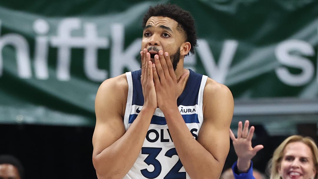 May 28, 2024; Dallas, Texas, USA; Minnesota Timberwolves center Karl-Anthony Towns (32) reacts to his fifth foul against the Dallas Mavericks during the fourth quarter of game four of the western conference finals for the 2024 NBA playoffs at American Airlines Center.