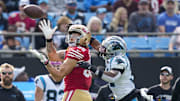 Oct 9, 2022; Charlotte, North Carolina, USA; San Francisco 49ers tight end George Kittle (85) waits for the pass covered by Carolina Panthers safety Juston Burris (31) during the first quarter at Bank of America Stadium. 
