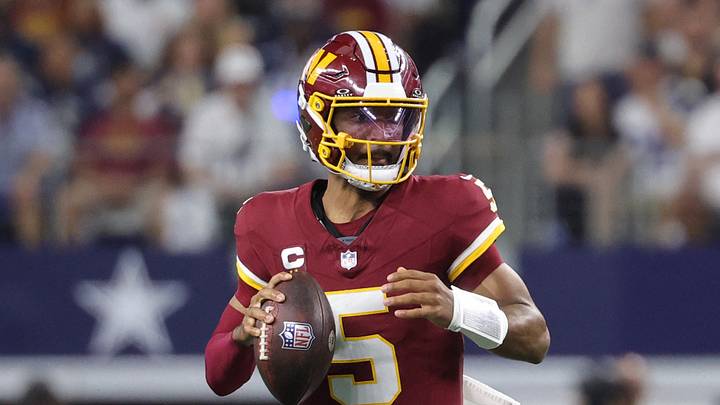 Sep 20, 2026; Arlington, Texas, USA;  Washington Commanders quarterback Jayden Daniels (5) drops back to pass against the Dallas Cowboys during the first half at AT&T Stadium.  Mandatory Credit: Kevin Jairaj-Imagn Images