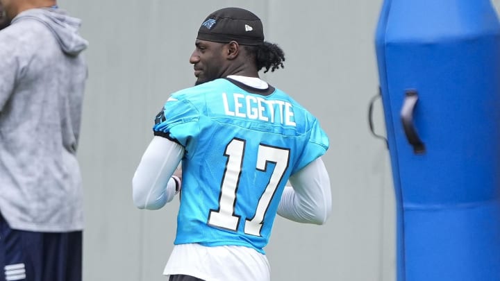 Jun 4, 2024; Charlotte, NC, USA; Carolina Panthers wide receiver Xavier Legette (17) throws  during OTAs. Mandatory Credit: Jim Dedmon-USA TODAY Sports