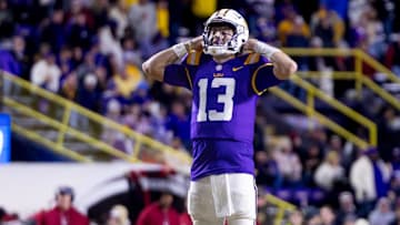 Nov 30, 2024; Baton Rouge, Louisiana, USA;  LSU Tigers quarterback Garrett Nussmeier (13) reacts to missing a pass against the Oklahoma Sooners during the fourth quarter at Tiger Stadium. Mandatory Credit: Stephen Lew-Imagn Images