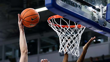 Mar 4, 2025; Colorado Springs, Colorado, USA; Boise State Broncos forward Andrew Meadow (13) drives to the basket against Air Force Falcons guard Byron Brown (11) in the first half at Clune Arena. Mandatory Credit: Isaiah J. Downing-Imagn Images