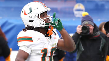 Nov 29, 2025; Pittsburgh, Pennsylvania, USA;  Miami Hurricanes wide receiver Malachi Toney (10) reacts after catching a touchdown pass against the Pittsburgh Panthers during the second quarter at Acrisure Stadium. Mandatory Credit: Charles LeClaire-Imagn Images
