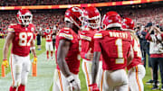 Oct 7, 2024; Kansas City, Missouri, USA; Kansas City Chiefs quarterback Patrick Mahomes (15) celebrates with wide receiver Xavier Worthy (1) and wide receiver JuJu Smith-Schuster (9) after Worthy’s touchdown against the New Orleans Saints during the game at GEHA Field at Arrowhead Stadium. Mandatory Credit: Denny Medley-Imagn Images