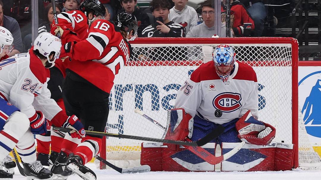 Apr 4, 2026; Newark, New Jersey, USA; Montréal Canadiens goaltender Jakub Dobes (75) makes stops the puck against the New Jersey Devils during the first period at Prudential Center. Mandatory Credit: Thomas Salus-Imagn Images