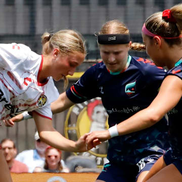 Anna Korney, left, fights for the ball with a few Minnesota Aurora FC defenders Friday at Highmark Stadium in Pittsburgh.  Korney is a 15-year-old student at DuBois High School and plays in the USL W League, which is a pre-professional league.