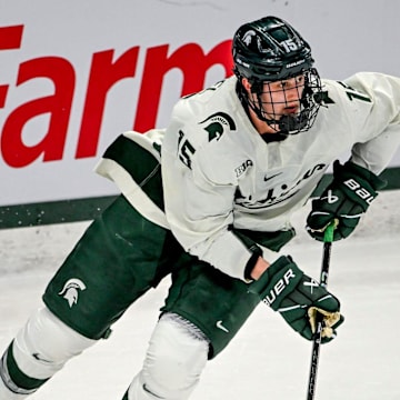 Michigan State's Charlie Stramel moves the puck against Notre Dame during the first period in the Big Ten tournament on Saturday, March 15, 2025, at Muni Arena in East Lansing.