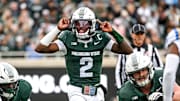 Michigan State's Aidan Chiles prepares for the snap against UCLA during the first quarter on Saturday, Oct. 11, 2025, at Spartan Stadium in East Lansing.