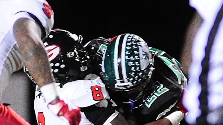 West Branch's Boston Mulinix is brought down by Glenville's Cincere Johnson in a regional quarterfinal playoff game Friday November 8, 2024. Michael Skolosh/Special to the Alliance Review