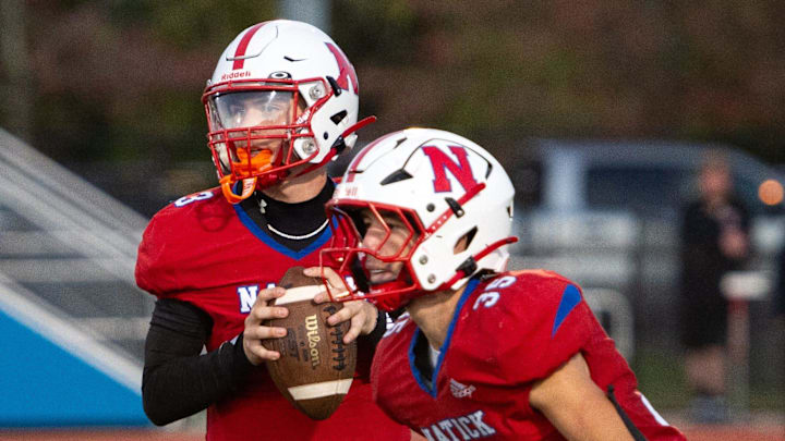 The Natick football team competes during the 2025 season.