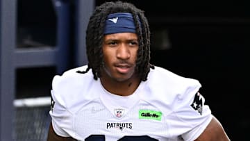 Jun 9, 2025; Foxborough, MA, USA; New England Patriots wide receiver Kyle Williams (18) and New England Patriots wide receiver Jeremiah Webb (29) walk to the practice fields at Gillette Stadium. Mandatory Credit: Eric Canha-Imagn Images