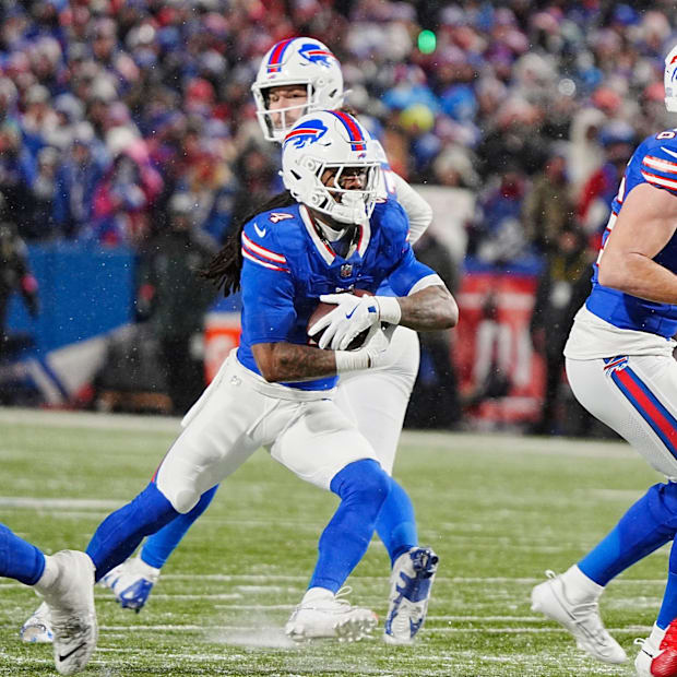  James Cook carries