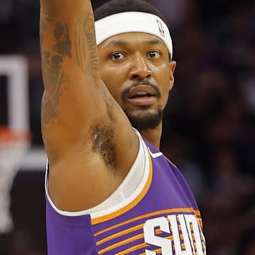 Apr 14, 2024; Minneapolis, Minnesota, USA; Phoenix Suns guard Bradley Beal (3) celebrates his basket against the Minnesota Timberwolves in the first quarter at Target Center. Mandatory Credit: Bruce Kluckhohn-Imagn Images