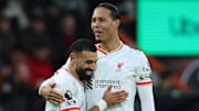 Virgil van Dijk (right) and Mohamed Salah recently signed new contract to stay at Liverpool.