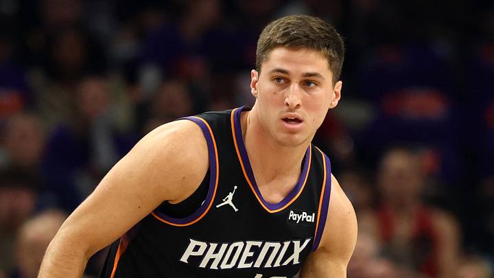 Apr 14, 2026; Phoenix, Arizona, USA; Phoenix Suns guard Collin Gillespie (12) against the Portland Trail Blazers during the play-in rounds of the 2026 NBA Playoffs at Mortgage Matchup Center. Mandatory Credit: Mark J. Rebilas-Imagn Images
