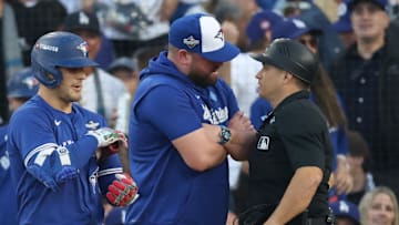 Blue Jays manager John Scneider wasn't happy after a delayed strike call from home plate umpire Mark Wegner