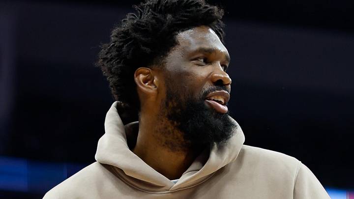 Mar 19, 2026; Sacramento, California, USA; Philadelphia 76ers center Joel Embiid (21) walks on the court in street clothes during the third quarter against the Sacramento Kings at Golden 1 Center. Mandatory Credit: Sergio Estrada-Imagn Images