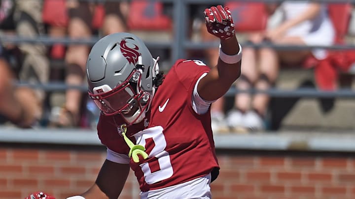 Aug 31, 2024; Pullman, Washington, USA; Washington State Cougars wide receiver Tre Shackelford (3) celebrates a touchdown against the Portland State Vikings in the first half at Gesa Field at Martin Stadium. Mandatory Credit: James Snook-Imagn Images