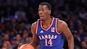Nov 18, 2025; New York, New York, USA; Kansas Jayhawks guard Melvin Council Jr. (14) dribbles up court during the first half against the Duke Blue Devils at Madison Square Garden. Mandatory Credit: Vincent Carchietta-Imagn Images