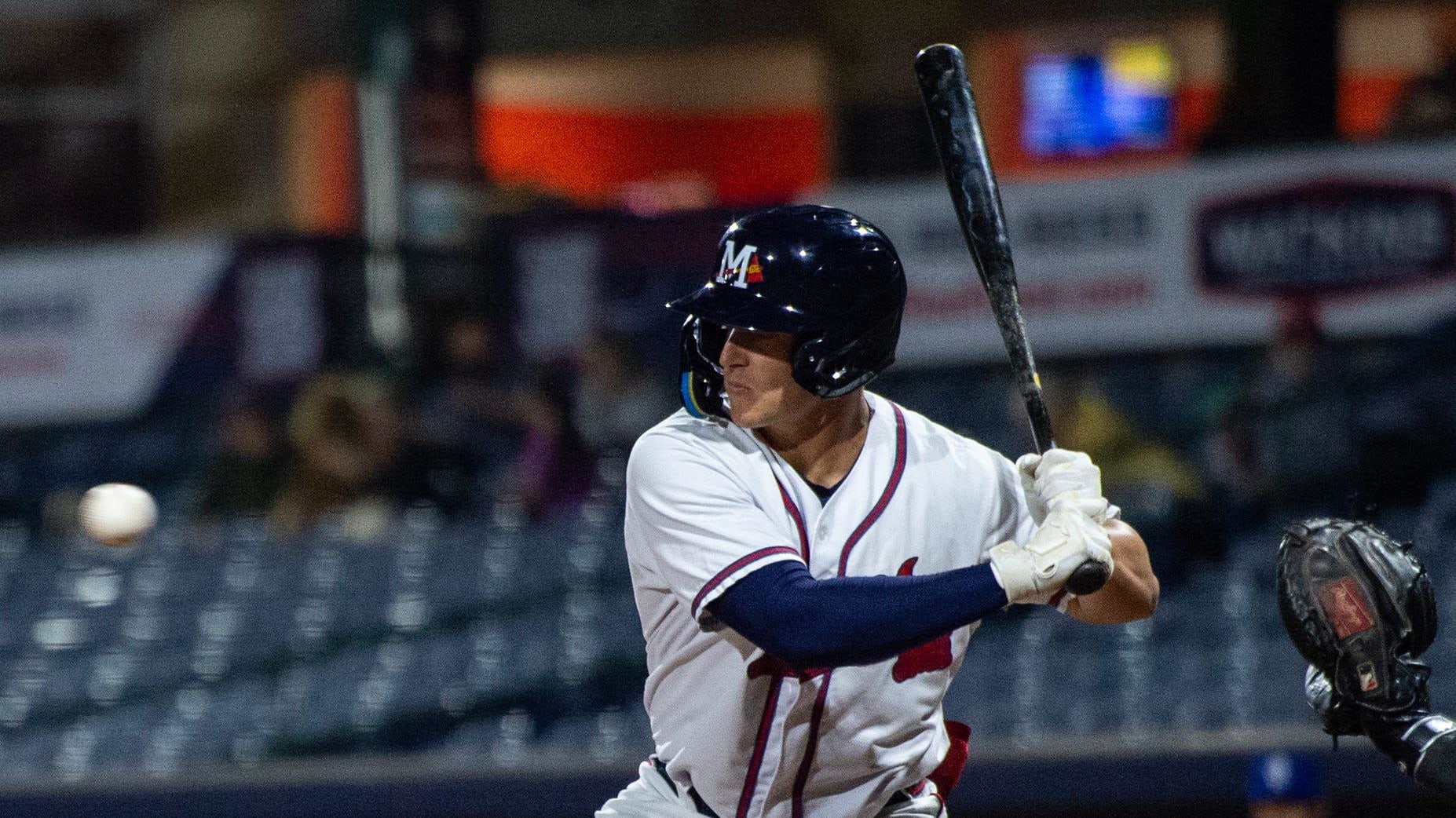 Mississippi Braves' Cade Bunnell (24) gears up to swing at the ball during a minor league contest. 