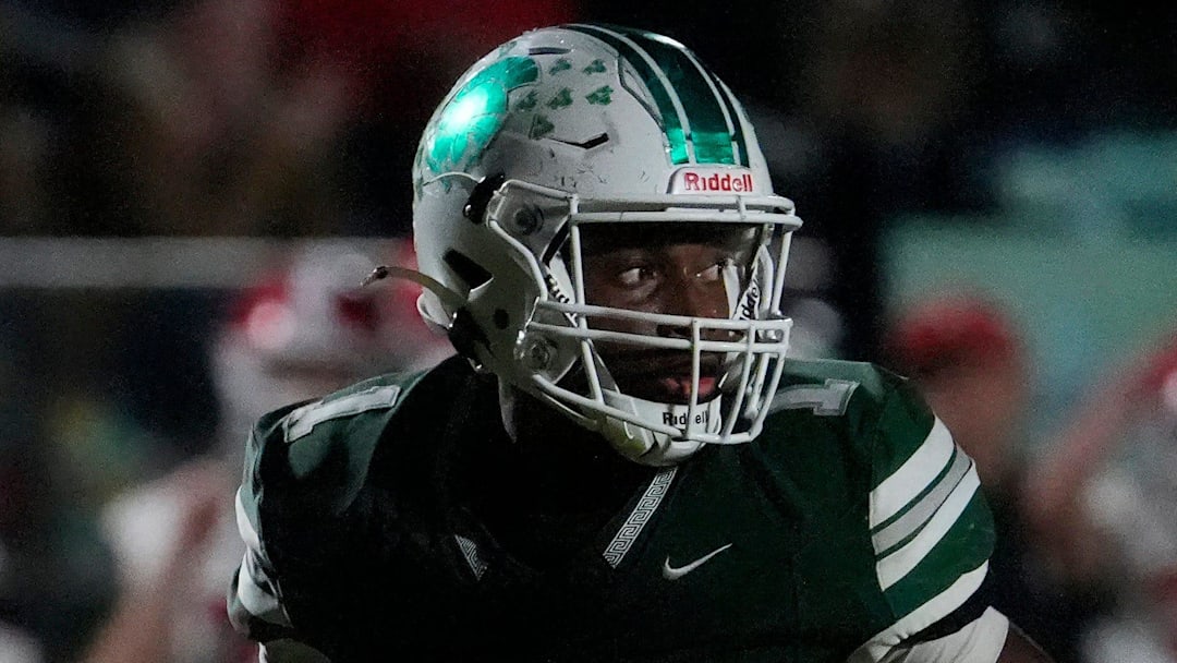 Athens Academy's Keyon Standifer (1) looks back while driving in for a touchdown during a GHSA high school football game against Rabun County in Athens, Ga., on Friday, Oct. 25, 2024.