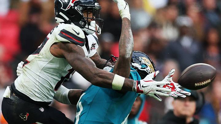 Football - NFL - Houston Texans v Jacksonville Jaguars - Wembley Stadium, London, Britain - October 18, 2026 Houston Texans' Nico Collins in action with Jacksonville Jaguars' Jarrian Jones Action Images via Reuters/Paul Childs.