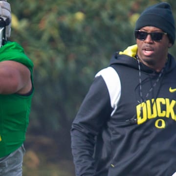 New co-defensive coordinator and safeties coach Chris Hampton, right, joins the first practice of spring for Oregon football as they prepare for the 2023 season.

Eug 031623 Uo Spring Fb 06