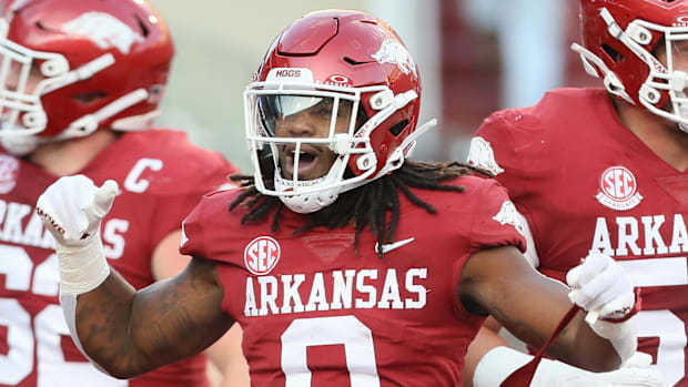 Razorbacks running back AJ Green (0) celebrates after scoring a touchdown int he first quarter against BYU.