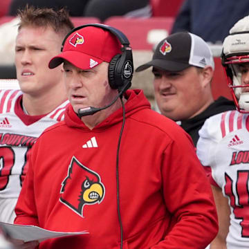 White Louisville’s head coach Jeff Brohm watches his team against Red Louisville in the Spring Game Friday night at L & N Stadium.
April 11, 2025