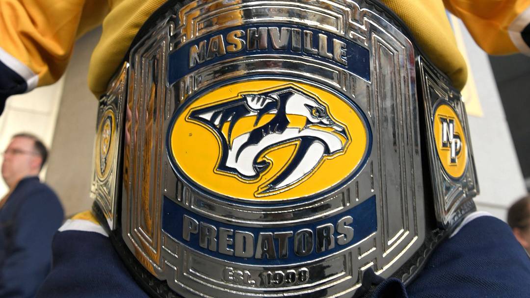 Scott Barry, known as \"The Ultimate Predator,\" stands outside before the divisional semifinal game at Bridgestone Arena in Nashville, Tenn., Wednesday, April 10, 2019.

Sem4365