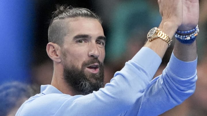 Jul 28, 2024; Nanterre, France; Michael Phelps waves to the crowd ahead of the night round of competition during the Paris 2024 Olympic Summer Games at Paris La Défense Arena.