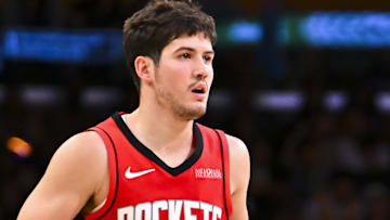 Houston Rockets guard Reed Sheppard (15) moves the ball against the Los Angeles Lakers during the second half at Crypto.com Arena.