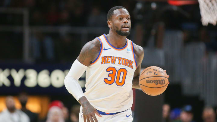 Nov 15, 2023; Atlanta, Georgia, USA; New York Knicks forward Julius Randle (30) dribbles against the Atlanta Hawks in the first quarter at State Farm Arena. Mandatory Credit: Brett Davis-USA TODAY Sports