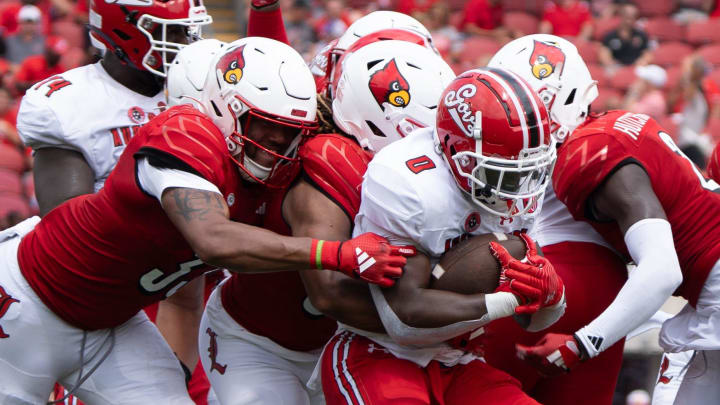 Louisville Cardinals tackle Austin Peay Governors running back O'Shaan Allison (0) during their game on Saturday, Aug. 31, 2024 at L&N Federal Credit Union Stadium in Louisville, Ky.