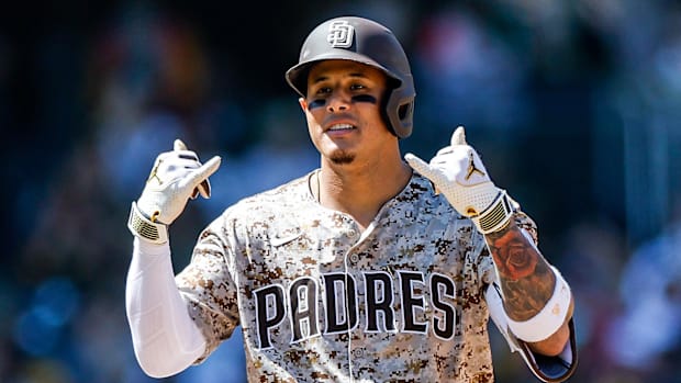 San Diego Padres third baseman Manny Machado (13) reacts after hitting a double