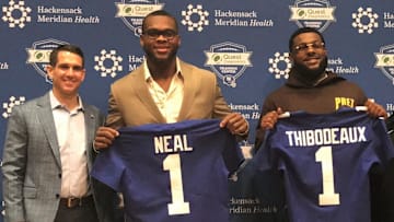 Giants general manager Joe Schoen, left, poses with first-round picks Evan Neal, center, and Kayvon Thibodeaux, right, at their introductory news conference Saturday in East Rutherford, NJ.

Schoen Neal Thibs A