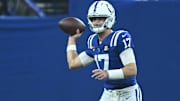 Nov 30, 2025; Indianapolis, Indiana, USA; Indianapolis Colts quarterback Daniel Jones (17) throws during the first half against the Houston Texans at Lucas Oil Stadium. Mandatory Credit: Robert Goddin-Imagn Images