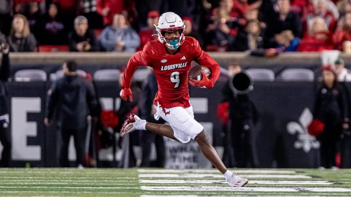 Louisville's Ahmari Huggins-Bruce (9) broke free for a long run during second half action as the Louisville Cardinals defeated the Notre Dame Fighting Irish, 33-20 on Saturday, Oct. 7, 2023