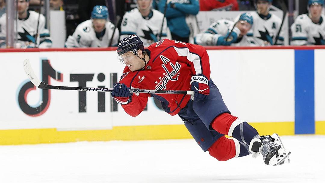 Jan 15, 2026; Washington, District of Columbia, USA; Washington Capitals defenseman John Carlson (74) shoots the puck against the San Jose Sharks during the third period at Capital One Arena. Mandatory Credit: Geoff Burke-Imagn Images
